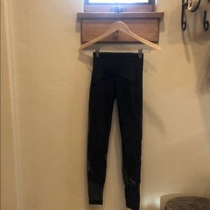 Lululemon leggings and vest.